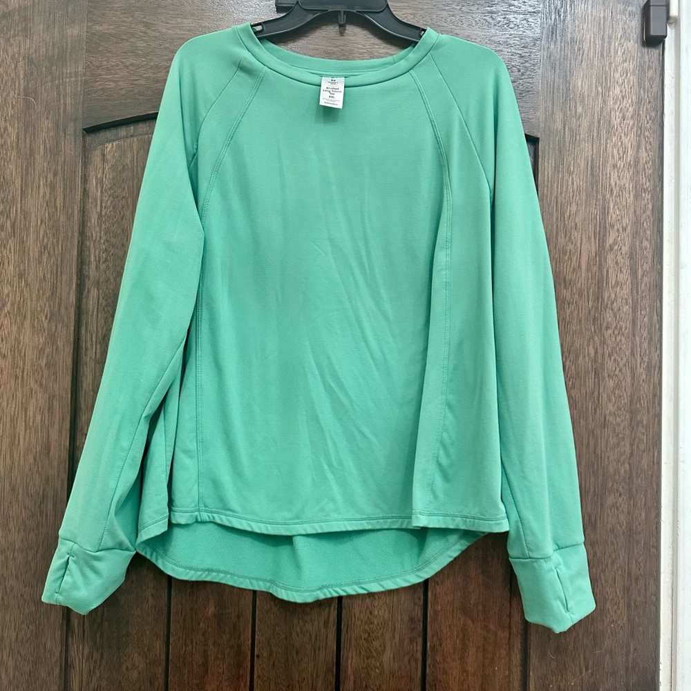 This is a warm workout shirt. Long sleeve with thumb holes